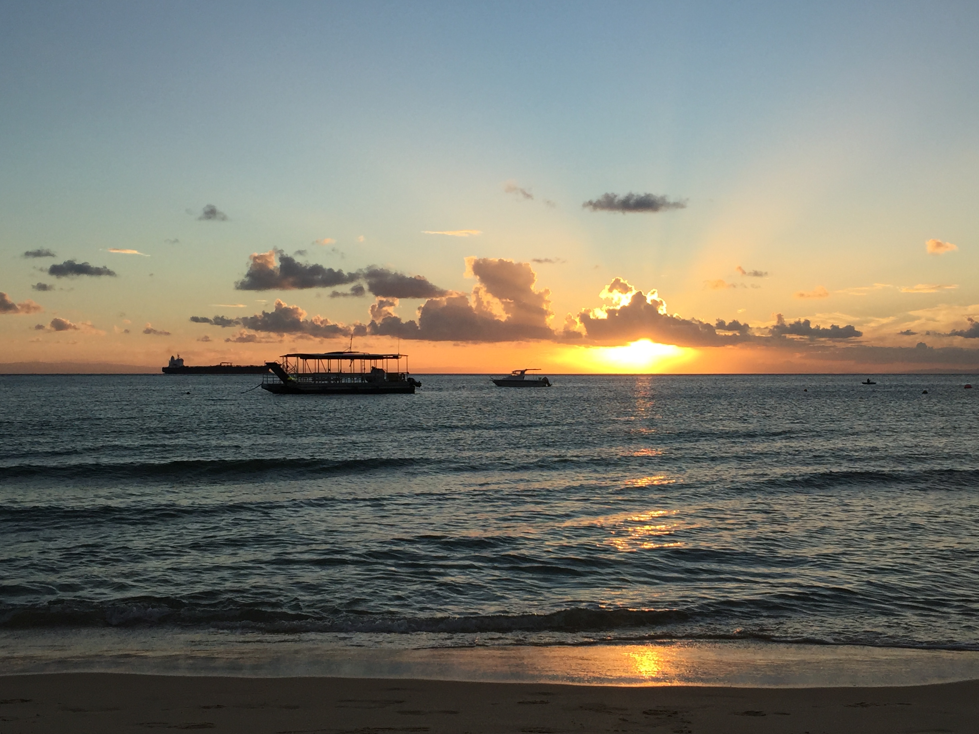 Boats on the sea at sunset